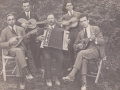Ralph Tartaglia (playing the mandolin) with friends in Atina